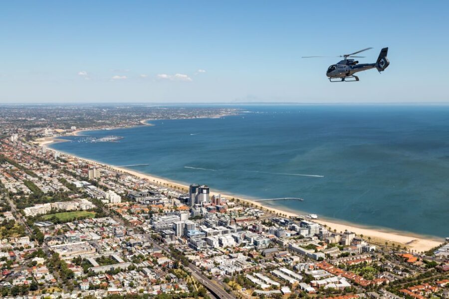 Melbourne: City and Bayside Helicopter Tour - Beach icons and the color of Melbourne: St. Kilda, Brighton Beach, and Luna Park
